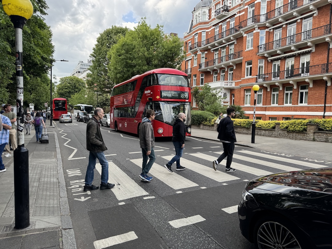 A stroll through Abbey Road. Watch out for that bus! Photo: Phil Castellano. [Editor's Note: Steve is last in line.]