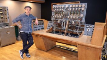 Tom Camuso, director of audio engineering at the Les Paul Recording Studio, showing off the internal electronics of The Monster. Photo: Steve Harvey.