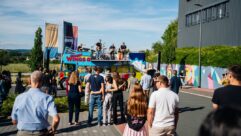 Drunkin’ Grownups—Adam Hall Group’s in-house employee band—tear it up atop the 1972 Wings Tour Bus.