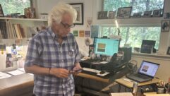 John Storyk in a familiar pose inside his office at WSDG, where he maintains an unending stream of email, text and phone calls about dozens of simultaneous projects going on around the world, exhibiting, in this writer’s opinion, an incredible ability to both multitask and focus, while at the same time slipping in a reference to his love of Yankees baseball and confirming lunch plans. Photo: Tom Kenny.