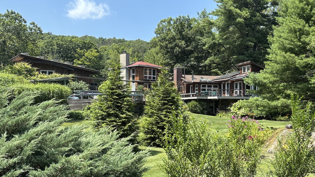 If you look closely, you will see a small peak to the left of the chimney, which is all that remains of the original cottage that Beth Walters lived in 38 years ago. Photo: Tom Kenny.