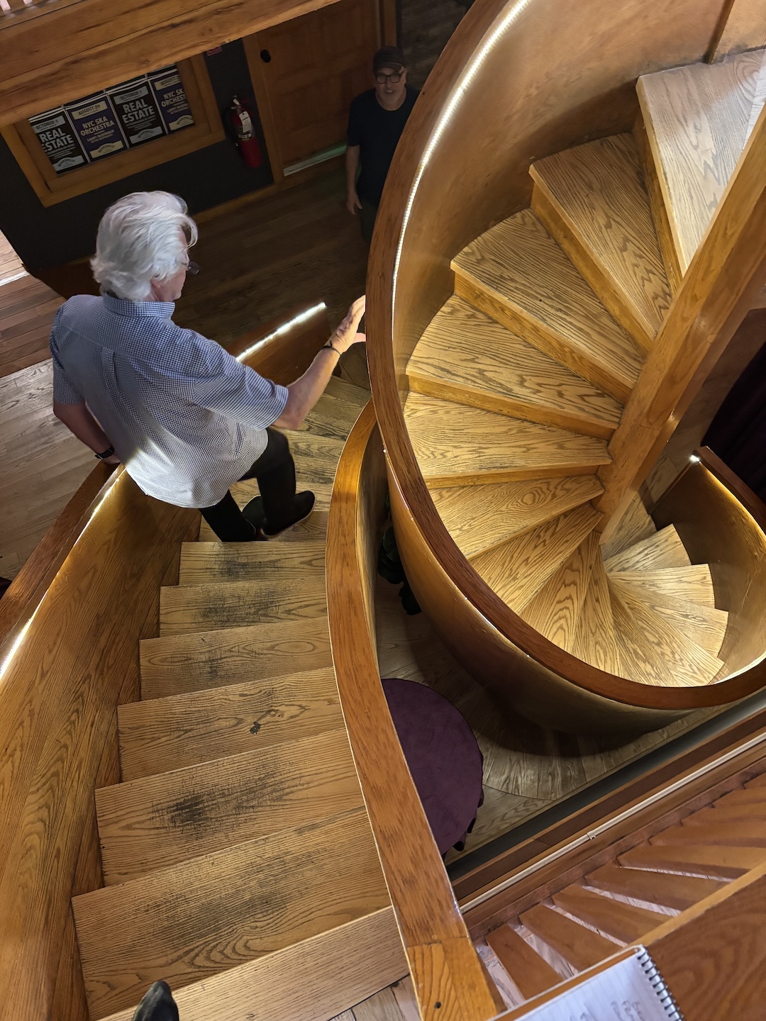 From the lounge and ticket area, guests can descend to the lower level via a unique, nested, double-spiral staircase, which Storyk says is “one of my favorite things I’ve ever designed, to this day.” Photo: Tom Kenny