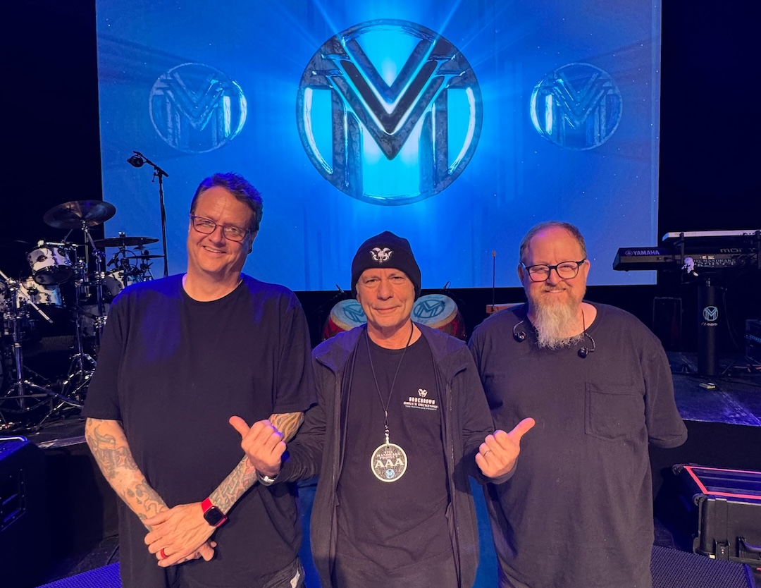 Out on the road for his first U.S. solo tour in nearly 30 years, Bruce Dickinson (center) pauses with FOH engineer/production manager Ken “Pooch” Van Druten (left) and Kevin “Tater” McCarthy. Photo: Courtesy of Ken Van Druten.