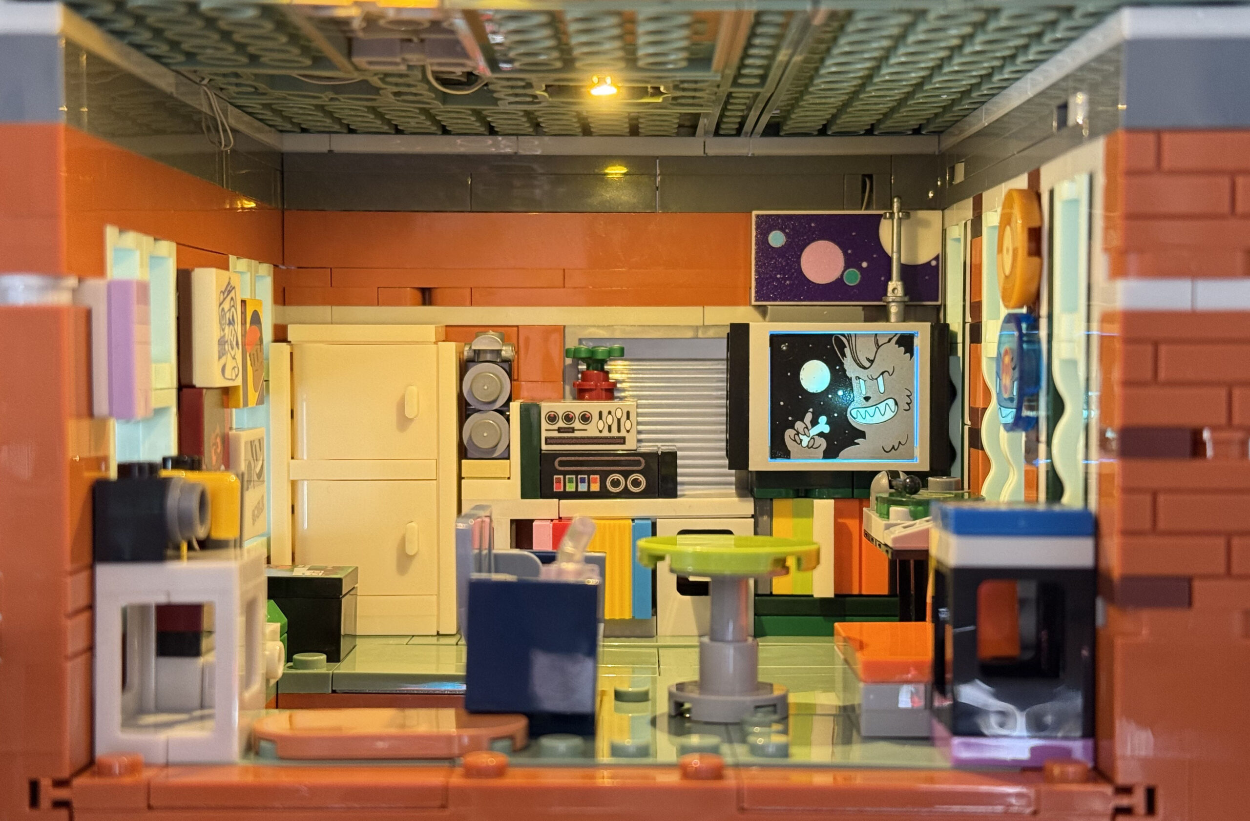 The third-floor lounge, complete with light-up TV set and a fridge with moving doors. Photo: Future.