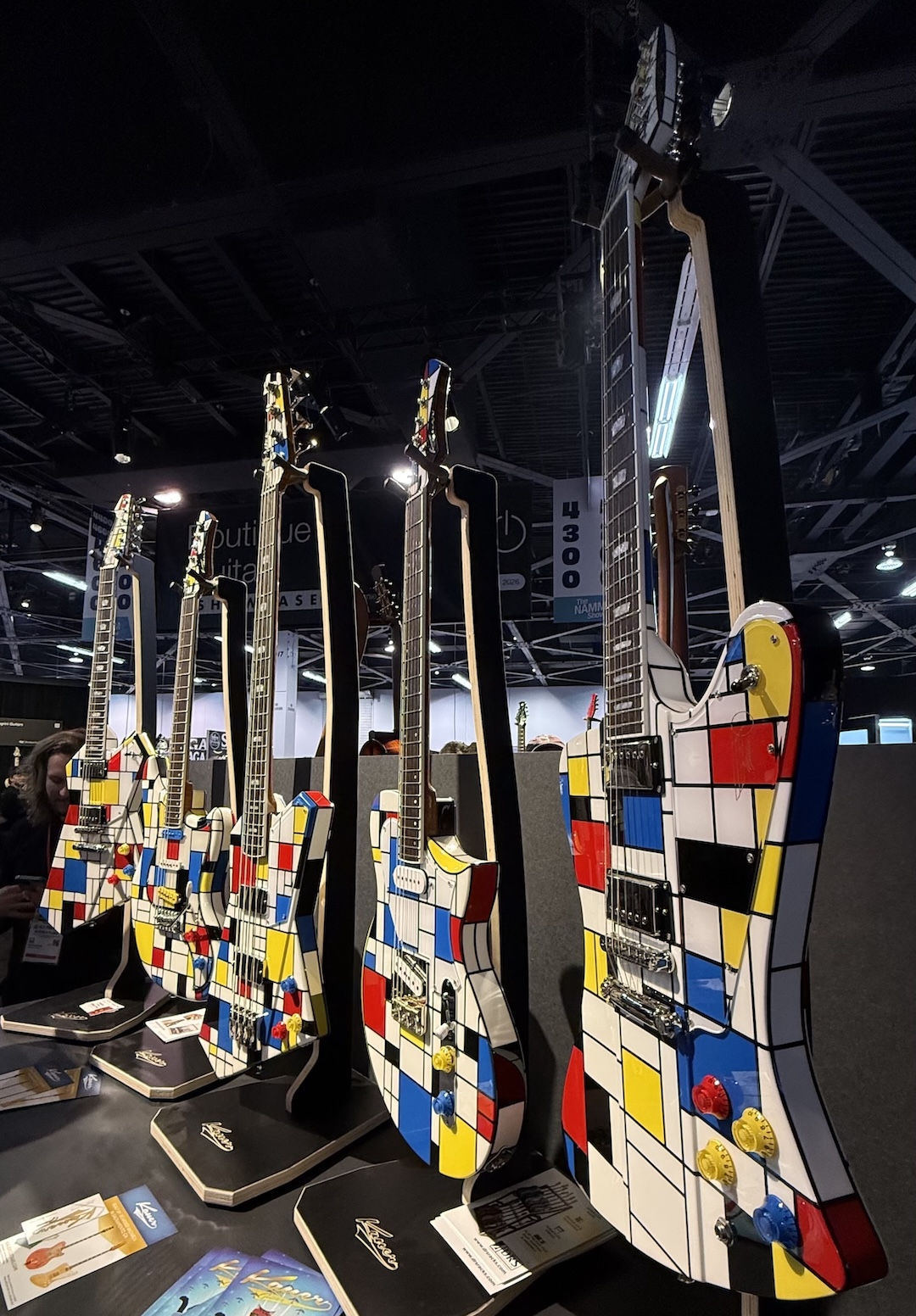I can't even play guitar (at least that's what the neighbors say) and even I wanted to take all five Mondrian-inspired guitars by Kauer Guitars home with me.