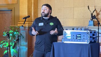 Mike Petruccelli, senior product specialist at Shure, demonstrates the new SLX-D+ wireless mic system at The Village. Photo: Future.