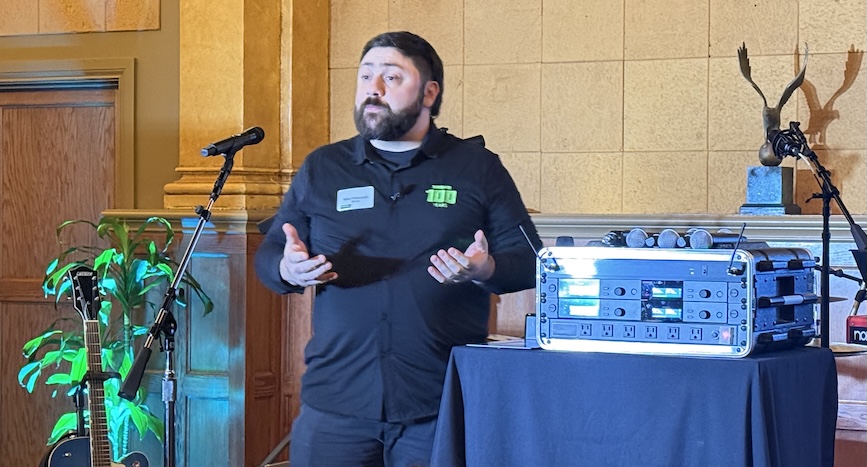 Mike Petruccelli, senior product specialist at Shure, demonstrates the new SLX-D+ wireless mic system at The Village. Photo: Future.