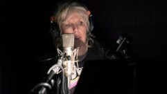 Lucinda Williams singing into a Neumann U 67 during the tracking of World’s Gone Wrong. Photo: Courtesy of Ray Kennedy.