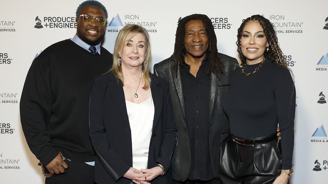 The Recording Academy Producers & Engineers Wing (P&E Wing), celebrating its 25th anniversary in 2026, hosted its annual Grammy Week Celebration on Wednesday, Jan. 28, at The Preserve LA in Los Angeles. This year’s celebration recognized legendary producer, engineer, mixer and five-time Grammy winner Jimmy Douglass for his extraordinary career and lasting impact on recorded music. Shown L – R: David “Swagg” Harris, P&E Wing Co-Chair; Maureen Droney, P&E Wing Vice President; Jimmy Douglass; and Marcella Araica, P&E Wing Co-Chair. Photo: Maury Phillips/Getty Images for The Recording Academy. 