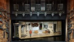The unique set of 'Dog Day Afternoon' spins to reveal both inside and outside the bank. Above hangs a sizable L-Acoustics P.A.