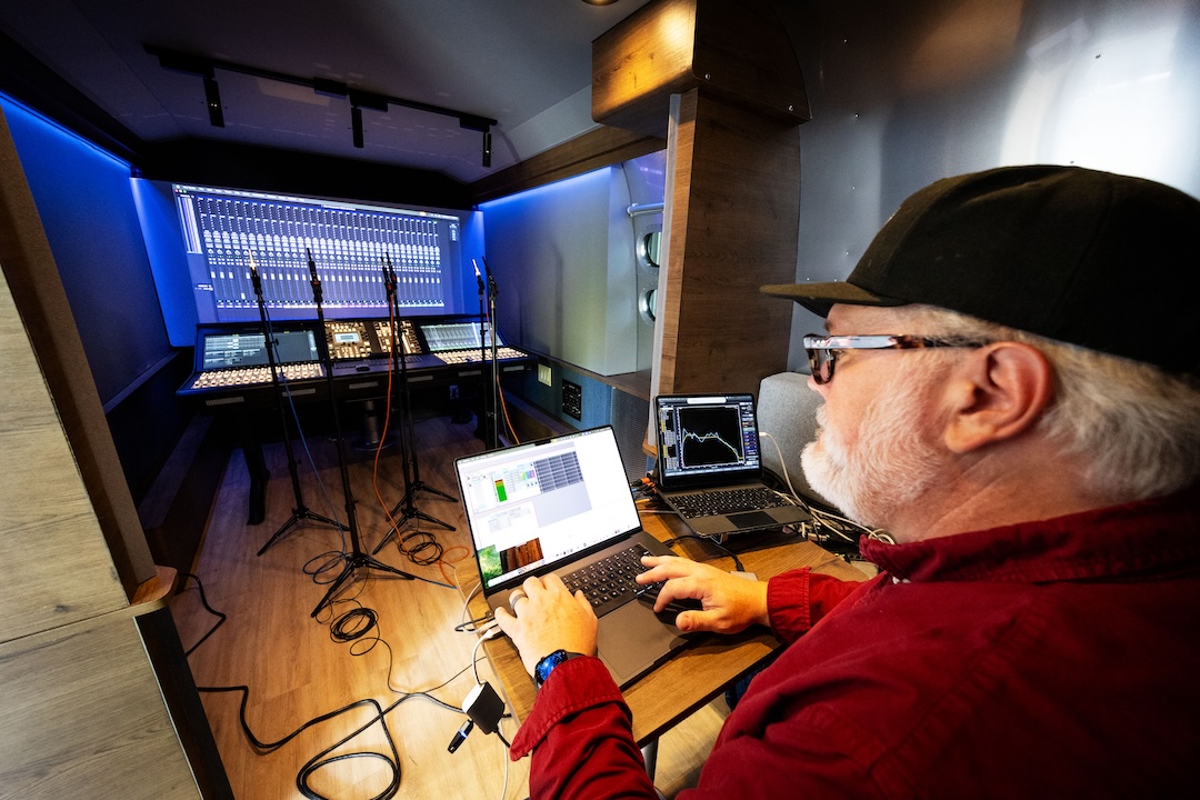 Bryan Pennington, Senior Staff Engineer from Dolby Laboratories tunes the Dolby Atmos setup of the Sweetwater Airstream. Photo: Sweetwater.