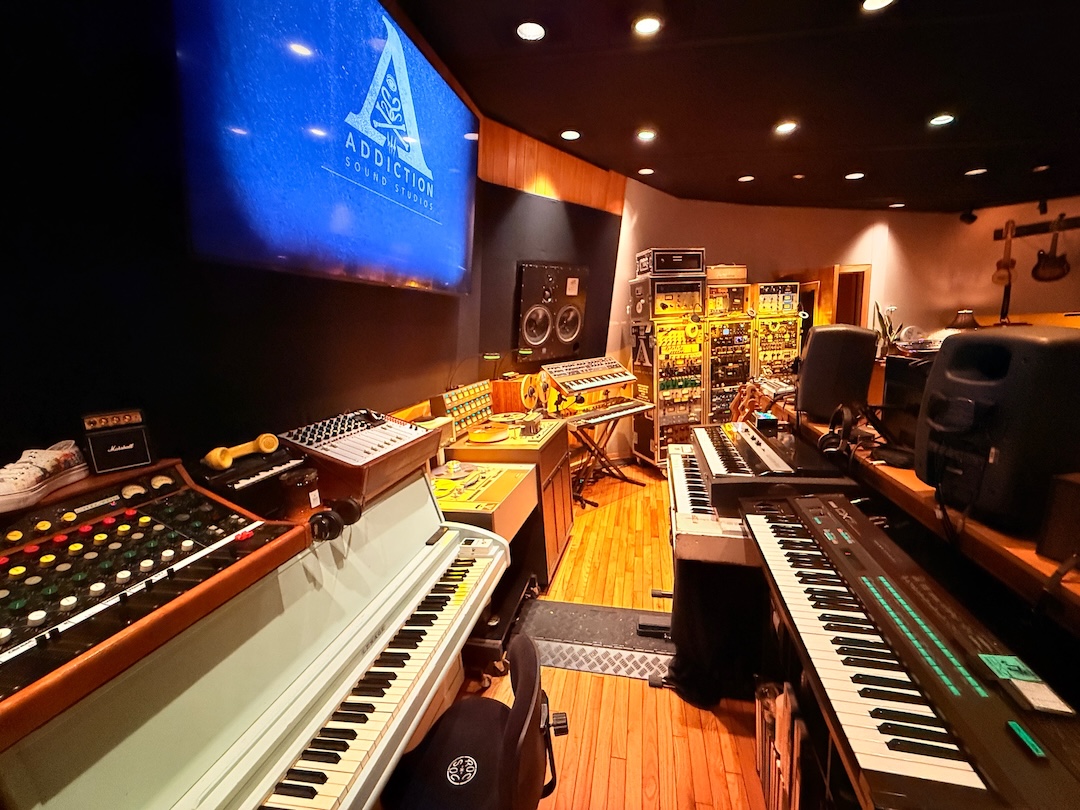 Behind the console, referred to as “Analog Alley,” which includes Jonathan Cain’s original Jupiter 8 and Prophet-5, from all the Journey records. Photo: David Kalmusky.