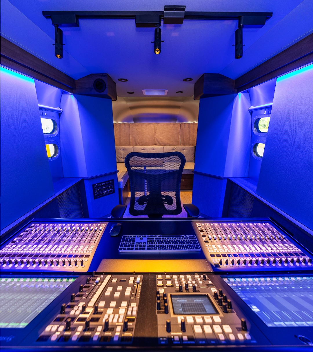 A view from the SSL System T desk into the rear lounge area. The (4) PMC ci65 surround and (4) ci30 height speakers are hidden behind the fabric. Photo: Matthew Owen
