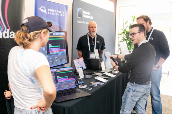 Attendees surround the OWC booth to learn more about Strada, an all-access , shared, local storage solution. Photo by Dajuana Jones/smug mug.